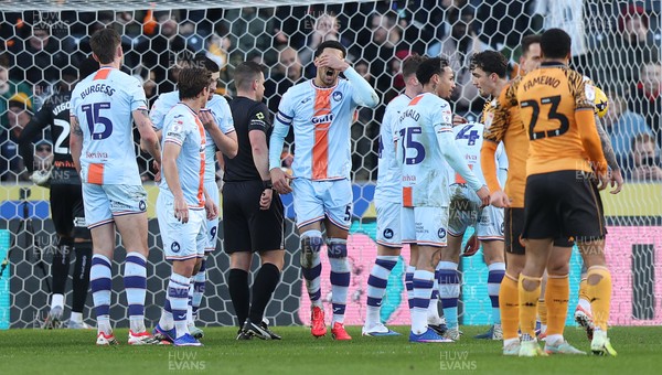 240126 - Hull City v Swansea City - Sky Bet Championship - Ben Cabango of Swansea is given a penalty decision against him