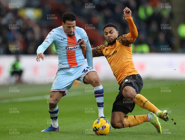 240126 - Hull City v Swansea City - Sky Bet Championship - Ronald of Swansea and Akin Famewo of Hull AFC