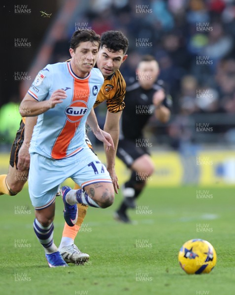 240126 - Hull City v Swansea City - Sky Bet Championship - Goncalo Franco of Swansea and John Egan of Hull AFC 