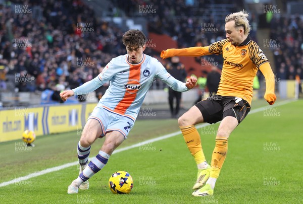 240126 - Hull City v Swansea City - Sky Bet Championship - Joshua Key of Swansea and Liam Millar of Hull AFC