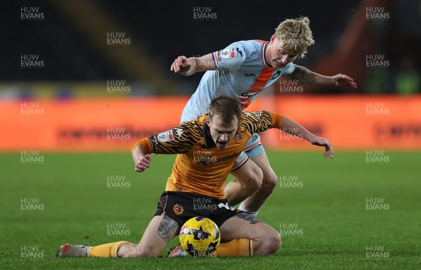 240126 - Hull City v Swansea City - Sky Bet Championship - Melker Widell of Swansea and Matty Jacob of Hull AFC