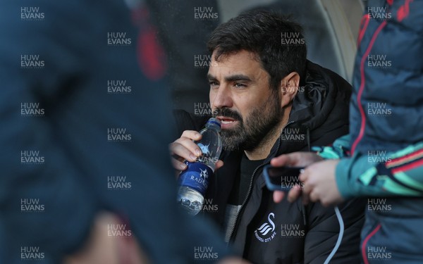 240126 - Hull City v Swansea City - Sky Bet Championship - Swansea manager Vitor Matos before the match in the dugout