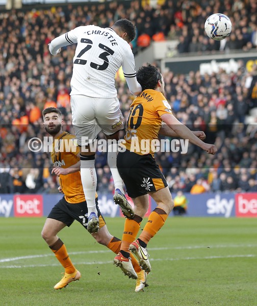 290122 - Hull City v Swansea City - Sky Bet Championship - Cyrus Christie of Swansea tries to nod the ball into the net