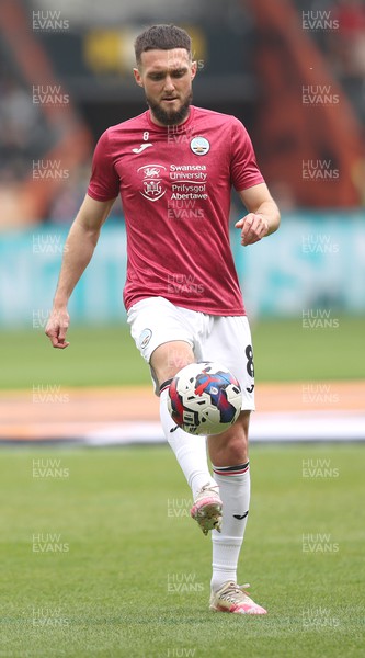 290423 - Hull City v Swansea City - Sky Bet Championship - Matt Grimes of Swansea warms up before match