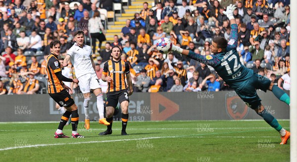 290423 - Hull City v Swansea City - Sky Bet Championship - Luke Cundle of Swansea scores the equaliser past Karl Darlow of Hull City in the 1st half