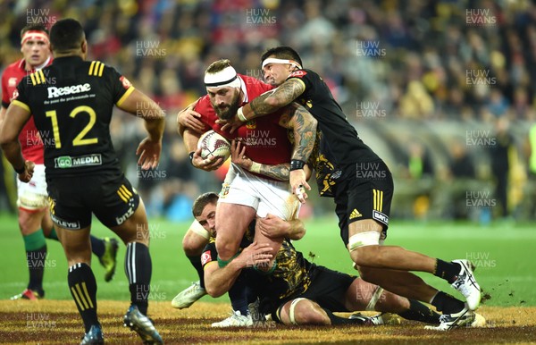 270617 - Hurricanes v British & Irish Lions - Joe Marler of British & Irish Lions is tackled by Vaea Fifita and Ricky Riccitelli of Hurricanes