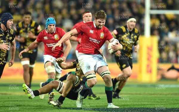 270617 - Hurricanes v British & Irish Lions - Iain Henderson of British & Irish Lions is tackled by Brad Shields of Hurricanes