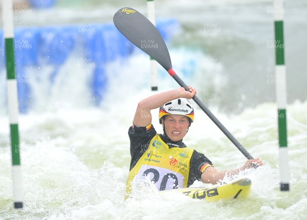 100612 - ICF_Canoe_Slalom_Cardiff - Pictured is German athlete Cindy Poeschel competing in the Kayak K1 Women Final race at the ICF Canoe World Cup 1, Cardiff - 