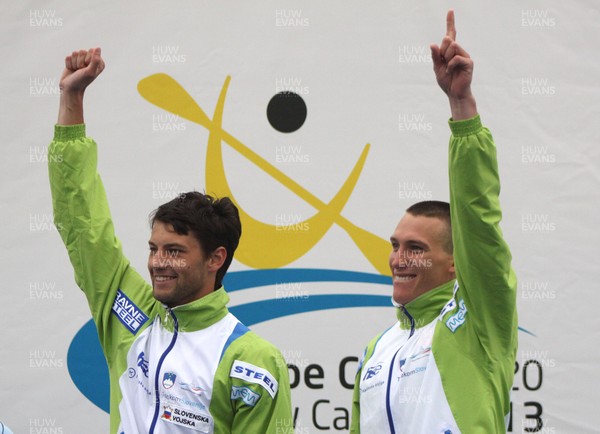 230613 - ICF Canoe Slalom World Cup Day 3-Luka Bozic and Saso Taljat of Slovenia stand on the podium after winning Bronze in the C2 Mens Double Final at the Canoe Slalom World Cup, Cardiff International White Water Centre