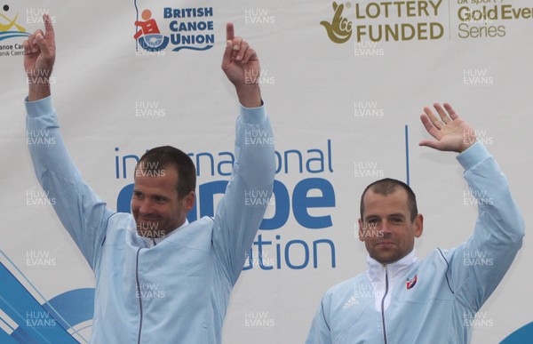 230613 - ICF Canoe Slalom World Cup Day 3-Pavol Hochschorner and Peter Hochschorner of Slovakia stand on the podium after winning Gold in the C2 Mens Double Final at the Canoe Slalom World Cup, Cardiff International White Water Centre