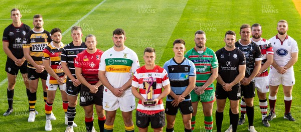 300823 - WRU Indigo Premiership League launch - Ioan Hughes, captain of current Indigo Premiership Champions, Llandovery, with the other 12 teams who will be competing in the 2023-24 competition