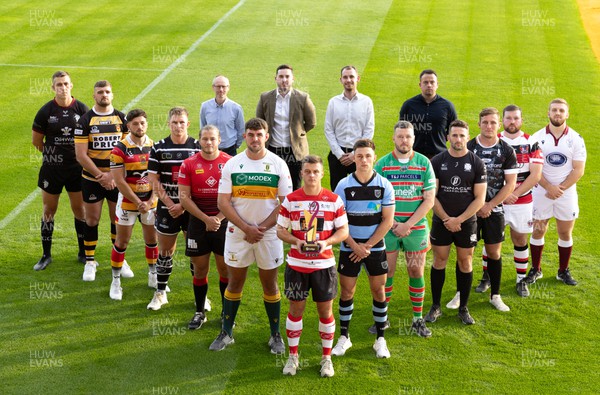 300823 - WRU Indigo Premiership League launch - Ioan Hughes, captain of current Indigo Premiership Champions, Llandovery, with the other 12 teams who will be competing in the 2023-24 competition, and representatives of Indigo