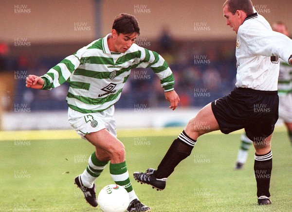 230797 - Inter Cable Tel v Celtic - Celtic J McNamara is challenged by W Hewitt