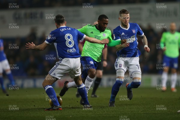 210218 - Ipswich Town v Cardiff City, Sky Bet Championship - Junior Hoilett of Cardiff City is tackled by Cole Skuse of Ipswich Town