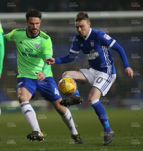 210218 - Ipswich Town v Cardiff City, Sky Bet Championship - Freddie Sears of Ipswich Town and Sean Morrison of Cardiff City compete for the ball