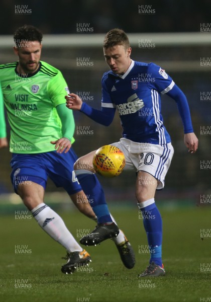 210218 - Ipswich Town v Cardiff City, Sky Bet Championship - Freddie Sears of Ipswich Town and Sean Morrison of Cardiff City compete for the ball