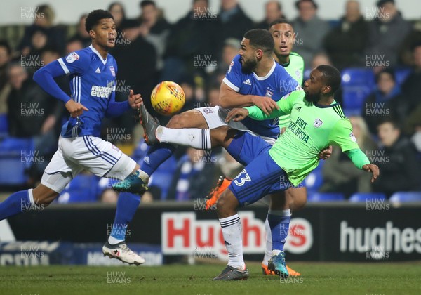 210218 - Ipswich Town v Cardiff City, Sky Bet Championship - Junior Hoilett of Cardiff City is challenged by Cameron Carter Vickers of Ipswich Town  as he plays the ball