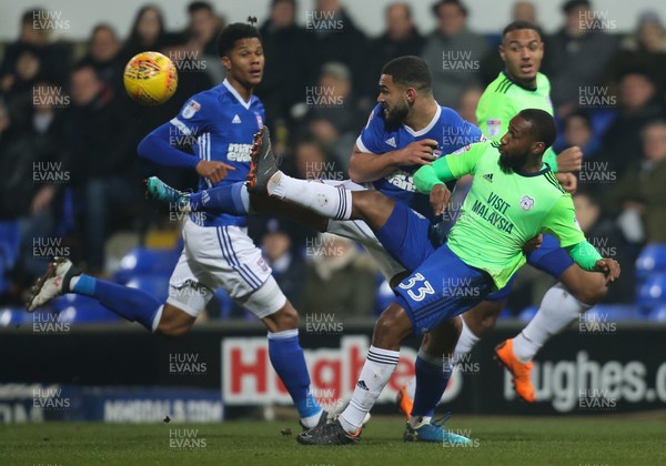 210218 - Ipswich Town v Cardiff City, Sky Bet Championship - Junior Hoilett of Cardiff City is challenged by Cameron Carter Vickers of Ipswich Town  as he plays the ball