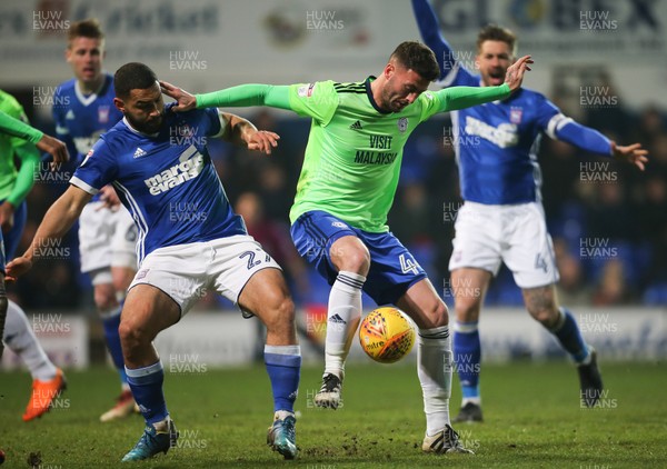 210218 - Ipswich Town v Cardiff City, Sky Bet Championship - Gary Madine of Cardiff City holds off Cameron Carter Vickers of Ipswich Town