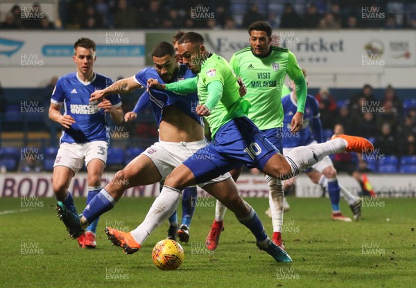 210218 - Ipswich Town v Cardiff City, Sky Bet Championship - Kenneth Zohore of Cardiff City holds off Cameron Carter Vickers of Ipswich Town as he fires a shot at goal
