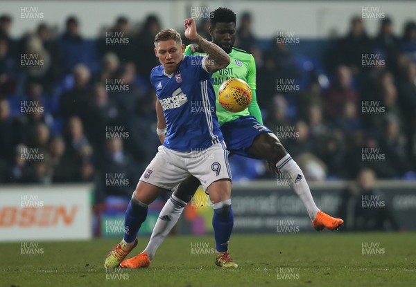 210218 - Ipswich Town v Cardiff City, Sky Bet Championship -Martyn Waghorn of Ipswich Town and Bruno Ecuele Manga of Cardiff City compete for the ball
