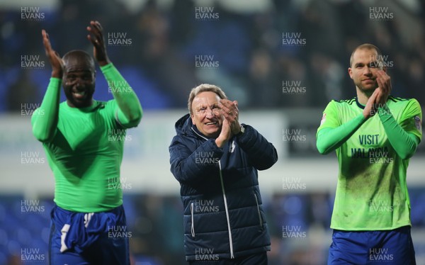210218 - Ipswich Town v Cardiff City, Sky Bet Championship - Cardiff City manager Neil Warnock applauds the travelling fans with Sol Bamba of Cardiff City and Matthew Connolly of Cardiff City at the end of the match