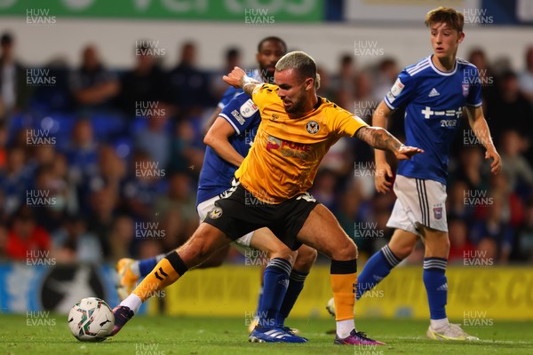 100821 - Ipswich Town v Newport County - Carabao Cup - Dom Telford of Newport County competes for the ball