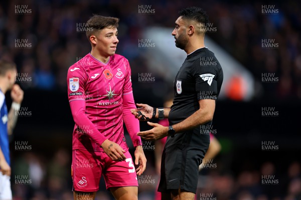 111123 - Ipswich Town v Swansea City - Sky Bet Championship - Harrison Ashby of Swansea City and referee Sunny Sukhvir Gill