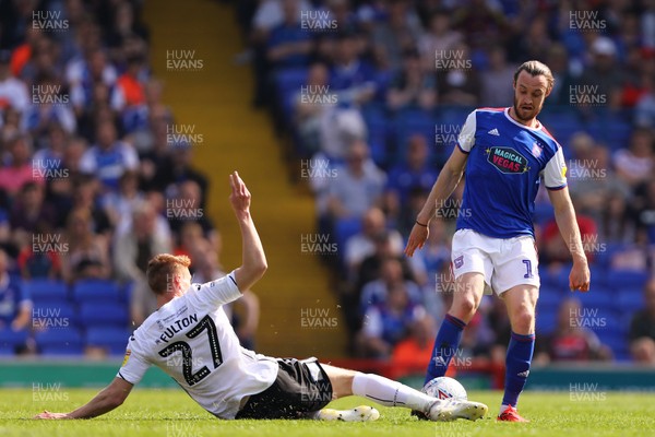 220419 - Ipswich Town v Swansea City - Sky Bet Championship - Will Keane of Ipswich Town is tackled by Jay Fulton of Swansea City