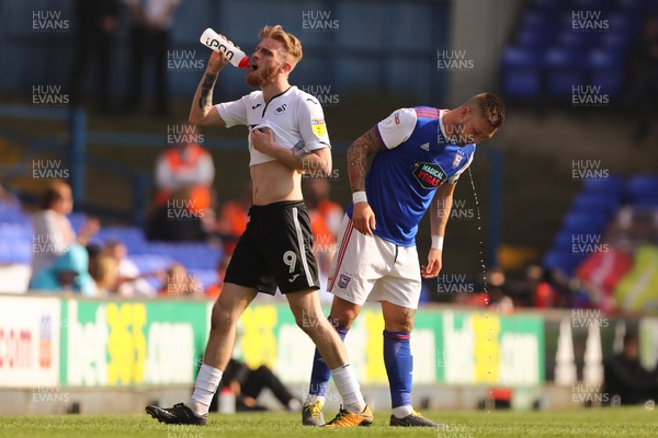 220419 - Ipswich Town v Swansea City - Sky Bet Championship - Luke Chambers of Ipswich Town and Oliver McBurnie of Swansea City