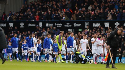 280226 - Ipswich Town v Swansea City - Sky Bet Championship - Both teams coming out 