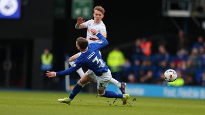 280226 - Ipswich Town v Swansea City - Sky Bet Championship - Ethan Galbraith of Swansea City and Leif Davis of Ipswich Town 