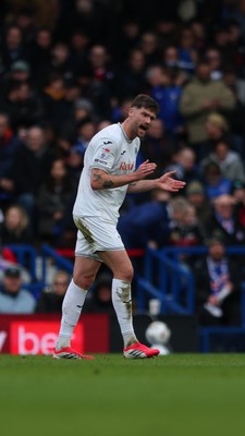 280226 - Ipswich Town v Swansea City - Sky Bet Championship - Cameron Burgess of Swansea City encouraging Swansea City after conceding the second goal to Ipswich Town