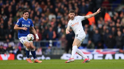 280226 - Ipswich Town v Swansea City - Sky Bet Championship - Cameron Burgess of Swansea City hitting cross field pass 
