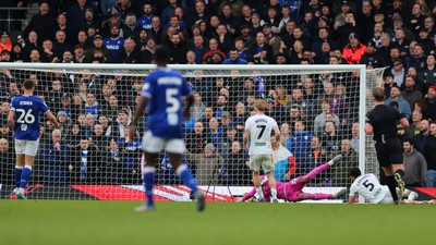 280226 - Ipswich Town v Swansea City - Sky Bet Championship - George Hirst of Ipswich Town scoring Ipswich Town 3rd goal past Lawrence Vigouroux of Swansea City 