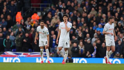 280226 - Ipswich Town v Swansea City - Sky Bet Championship - Marko Stamenic of Swansea City Ben Cabango of Swansea City dejected after conceding Ipswich Town 3rd goal 