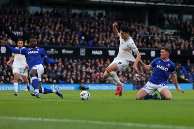 280226 - Ipswich Town v Swansea City - Sky Bet Championship - Zan Vipotnik of Swansea City having his shirt pulled by Dara O'Shea of Ipswich Town 