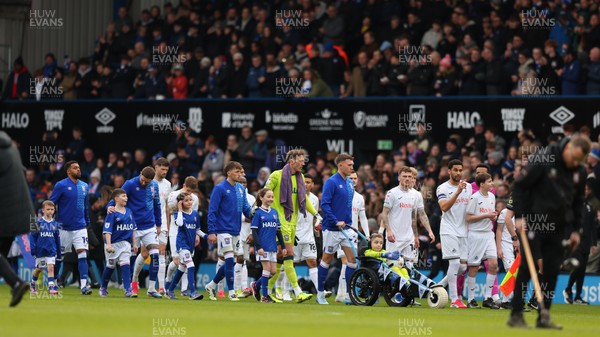 280226 - Ipswich Town v Swansea City - Sky Bet Championship - Both teams coming out 