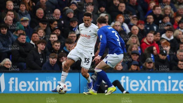 280226 - Ipswich Town v Swansea City - Sky Bet Championship - Ronald of Swansea City and Leif Davis of Ipswich Town 