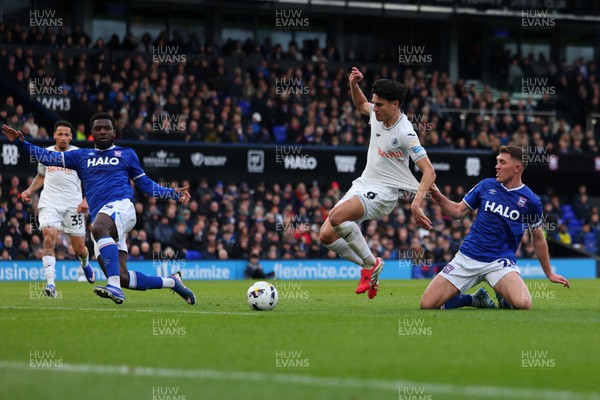 280226 - Ipswich Town v Swansea City - Sky Bet Championship - Zan Vipotnik of Swansea City having his shirt pulled by Dara O'Shea of Ipswich Town 