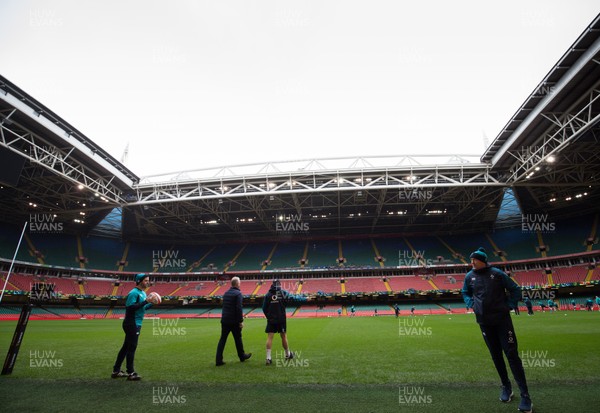 150319 - Ireland Rugby Captains Run, Principality Stadium - Ireland coach Joe Schmidt, centre, walks onto the pitch for a training session under an open roof at the Principality Stadium ahead of the Six Nations match against Wales tomorrow