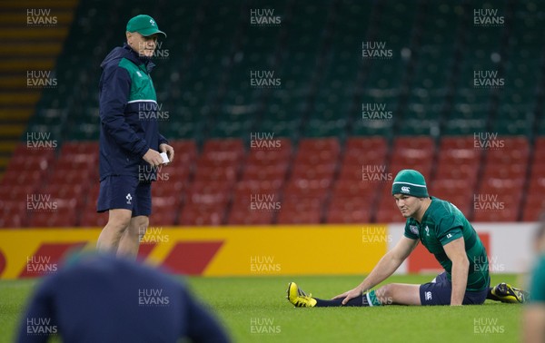 161015 - Ireland captains run, Millennium Stadium - Ireland coach Joe Schmidt talks with Jonny Sexton during a training session at the Millennium Stadium ahead of their Rugby World Cup Quarter Final match against Argentina