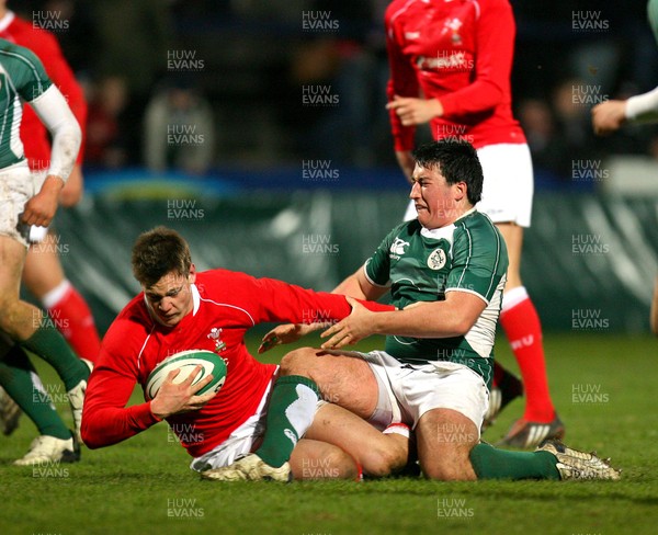 26.03.08 - Ireland v Wales - Under 18 Six Nations 2008 - Ireland's Denis Buckley tackles Ieuan Coombes of Wales 