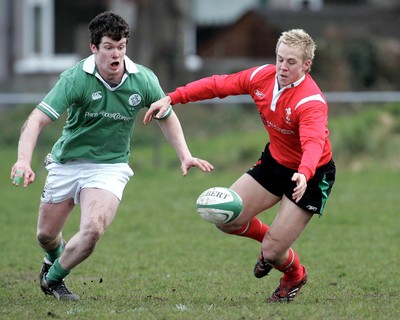 250206 Ireland U19 v Wales U19 -  Ian Whitten of Ireland and Ashley Smith of Wales 