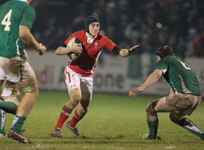 03.02.12  Ireland U20 v Wales U20.Wales Sam Davies takes on Conor Gilsenan..