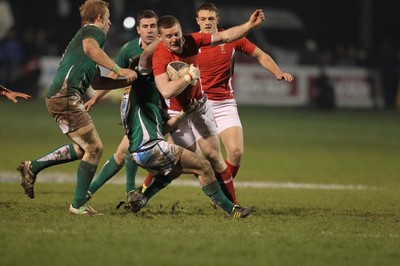 03.02.12  Ireland U20 v Wales U20.Wales Iolo Evans is tackled by  Kieron Marmion..