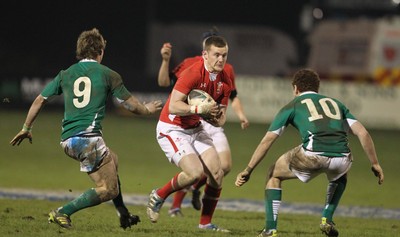 03.02.12  Ireland U20 v Wales U20.Wales Iolo Evans takes on Kieron Marmion and Patrick Jackson..