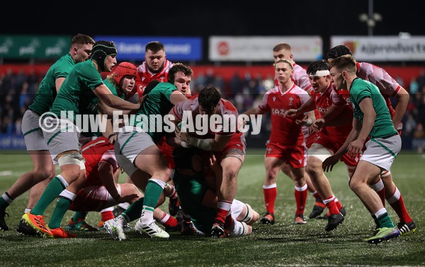 040222 - Ireland U20s v Wales U20s - U20s Six Nations Championship - Efan Daniel of Wales tries to drag himself over the line