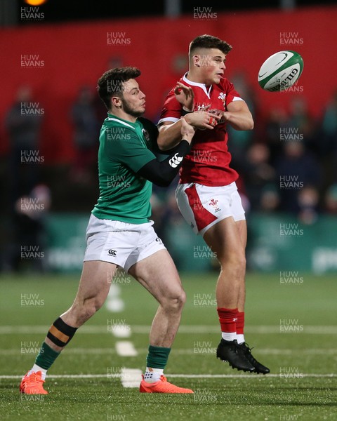 070220 - Ireland U20s v Wales U20s - U20s 6 Nations Championship - Ewan Rosser of Wales and Andrew Smith of Ireland go up for the ball
