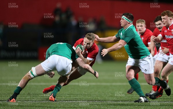 070220 - Ireland U20s v Wales U20s - U20s 6 Nations Championship - Sam Costelow of Wales is tackled by Thomas Ahern and Thomas Clarkson of Ireland